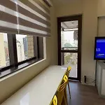 Qi Ibirapuera Intelligence Flat cozinha sala quarto e sacada UH2212