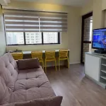 Qi Ibirapuera Intelligence Flat cozinha sala quarto e sacada UH2212